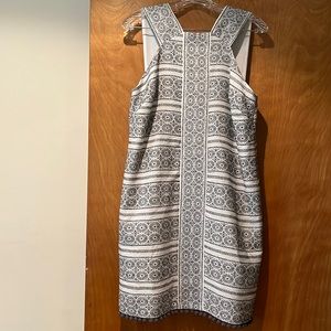 Maggy London black and white dress.  polyester , rayon and nylon, fully lined .